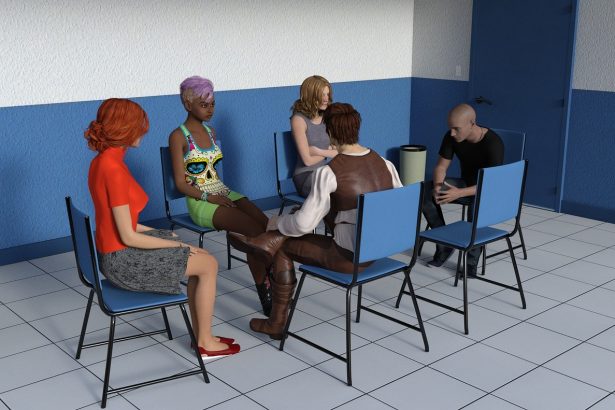 Grupo de pessoas reunido em círculo, conversando e trocando ideias em um encontro de apoio e cuidado coletivo